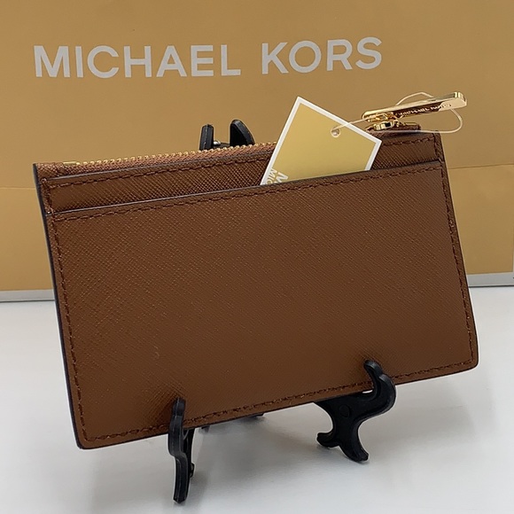 Michael Kors Jet Set Travel Medium Top Zip Card
Case Wallet LUGGAGE COLOR - Picture 9 of 11